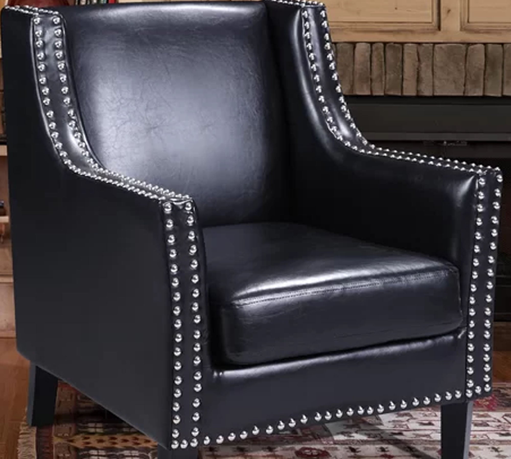 Lounge Chair Upholstered in Leatherette with Trackarms